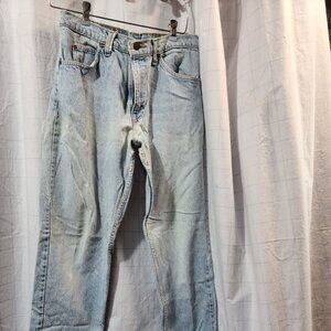 Ladies Levis 550 Stonewashed Blue Jeans size 31x32 ,acid washed, tapered legs
